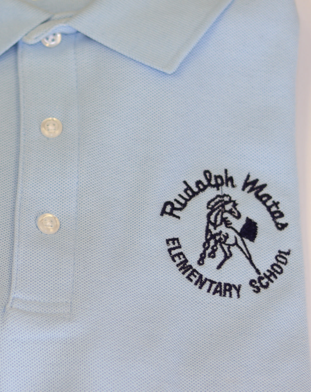 Rudolph Matas Elementary Polo Youth Light Blue French Toast